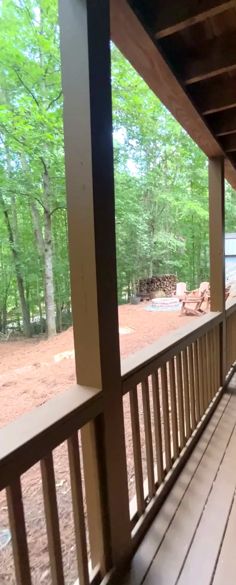 Covered private deck looking toward the woods